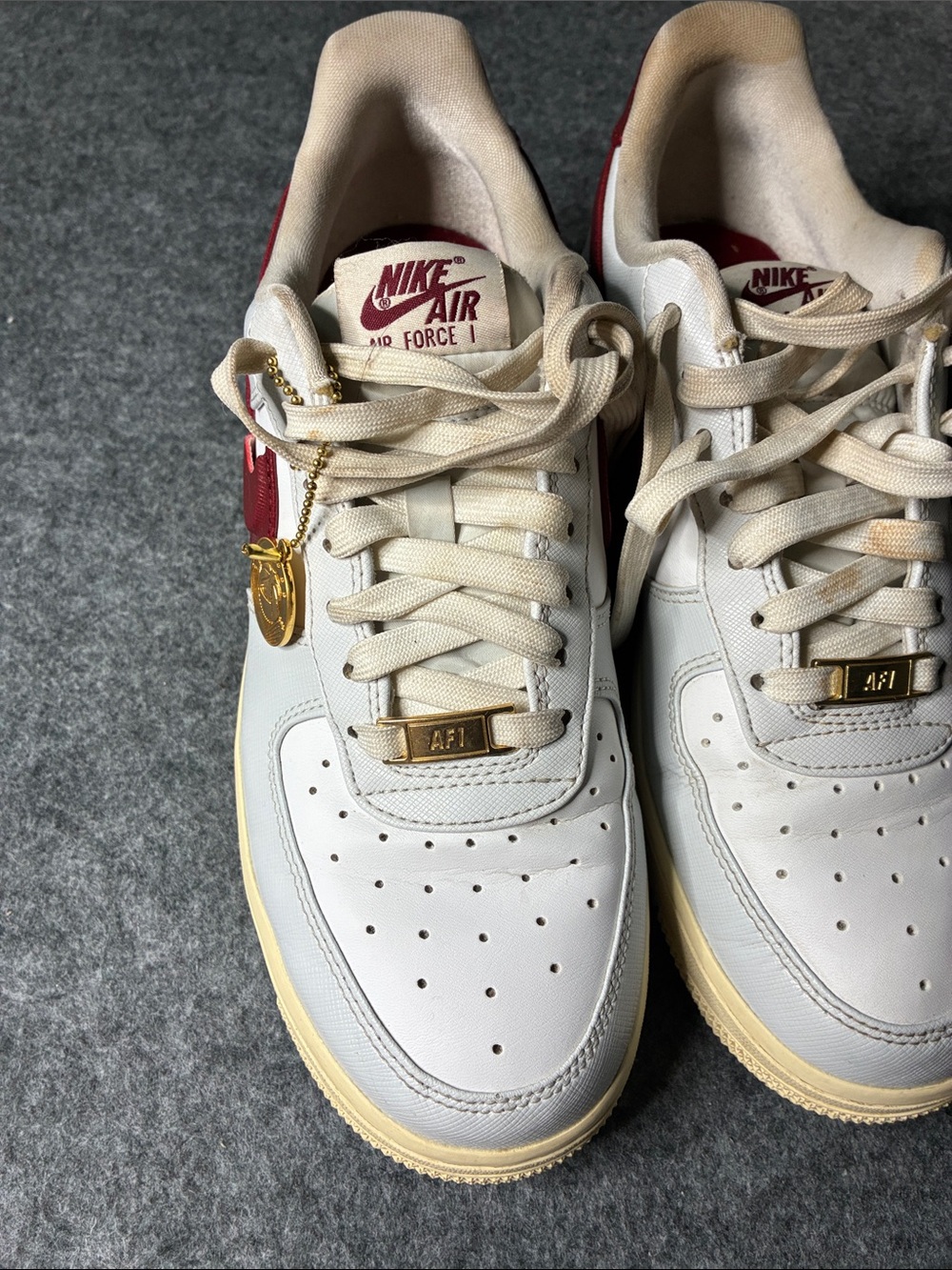 Nike Air Force 1 White with Red and Gold Details